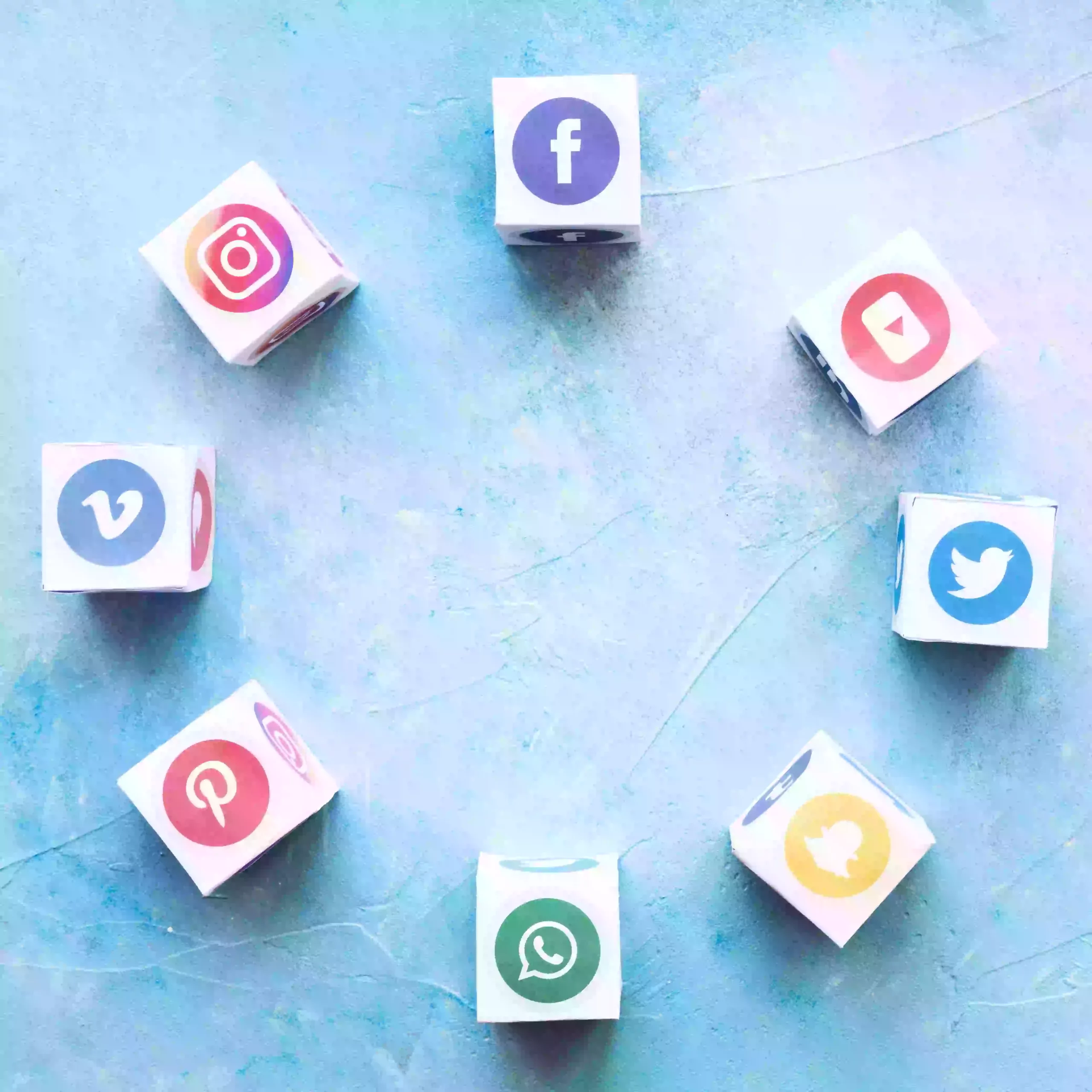 blocks-social-media-icons-arranged-circular-shape-textured-background blocks-social-media-icons-arranged-circular-shape-textured-background